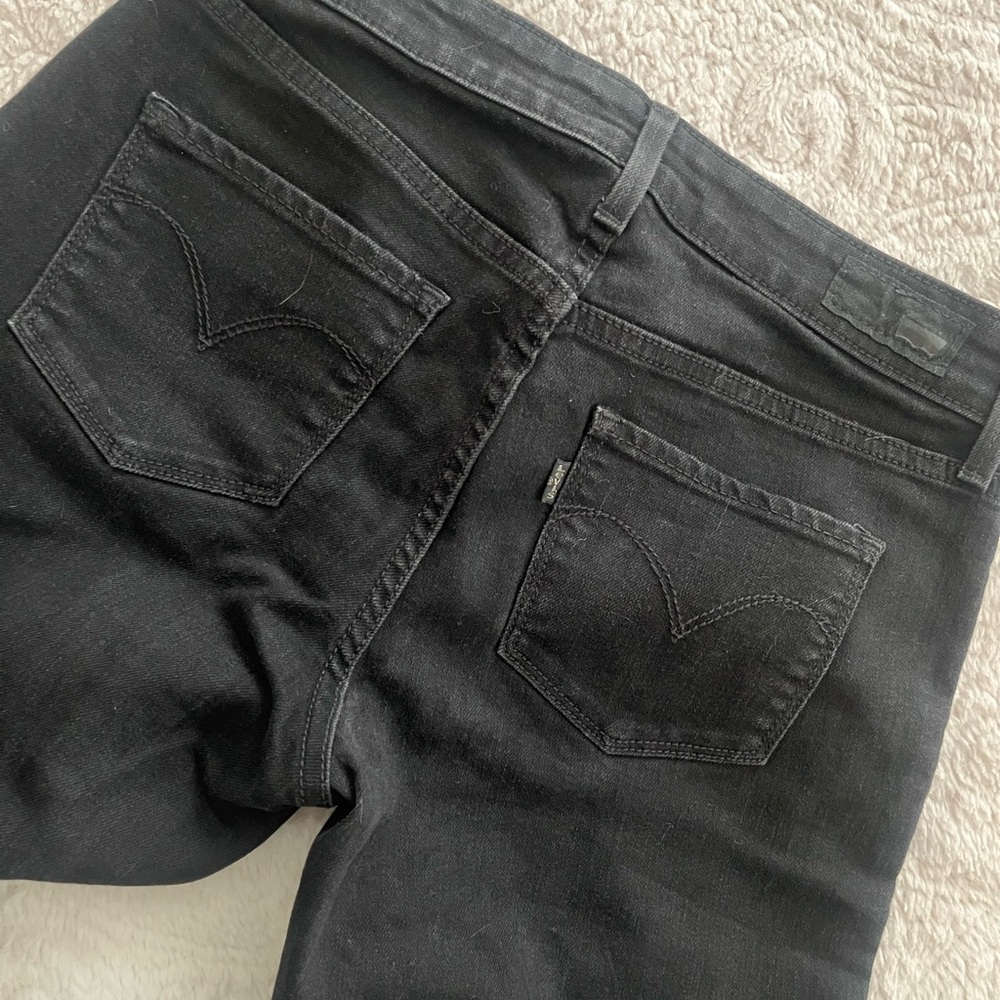 Black Slim Leg Levi’s Raw Hem